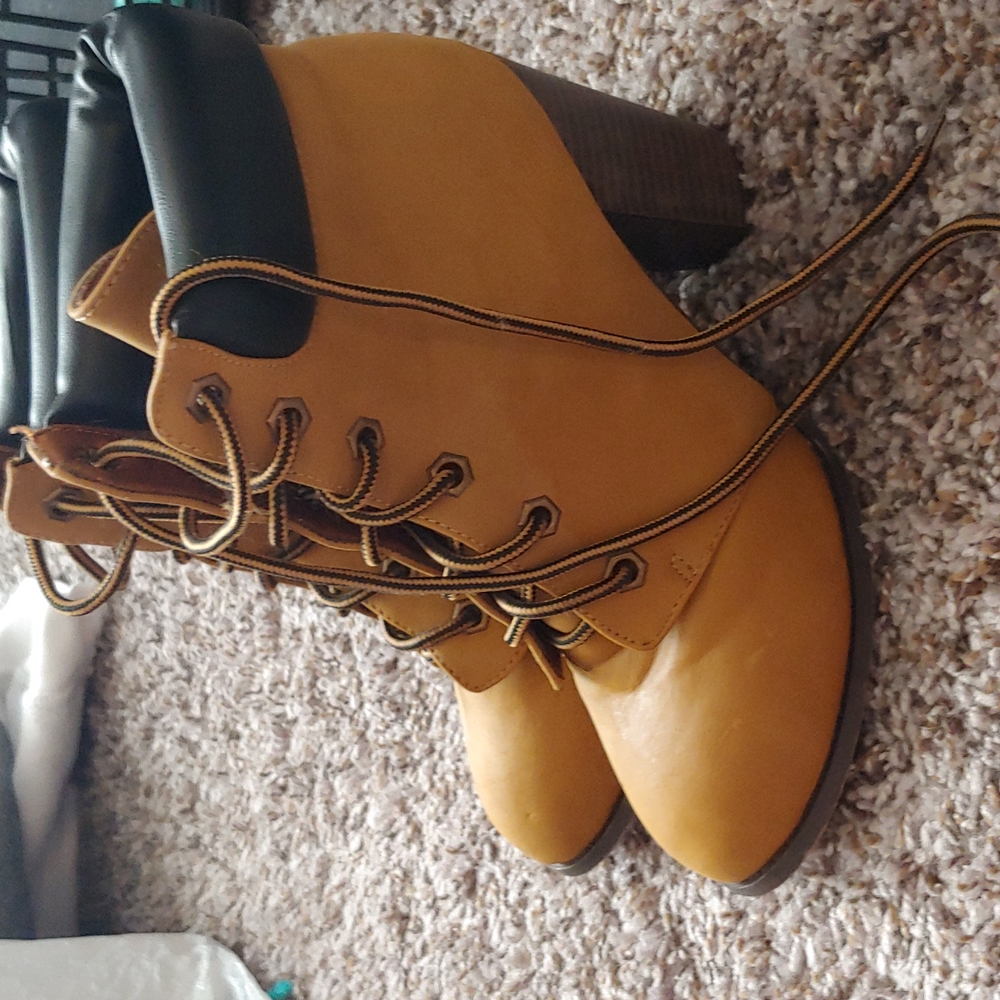 Tan and black high heel boots